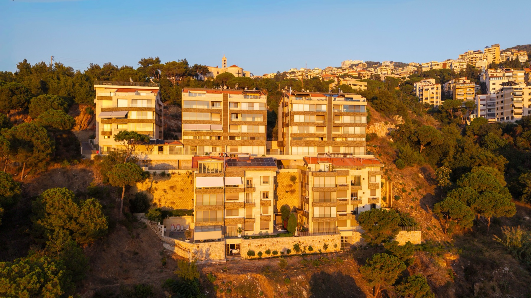 Aerial view at golden hour of the completed Ain Saadeh lot 3141 residence